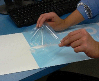 Selectively screen printed protective film being removed